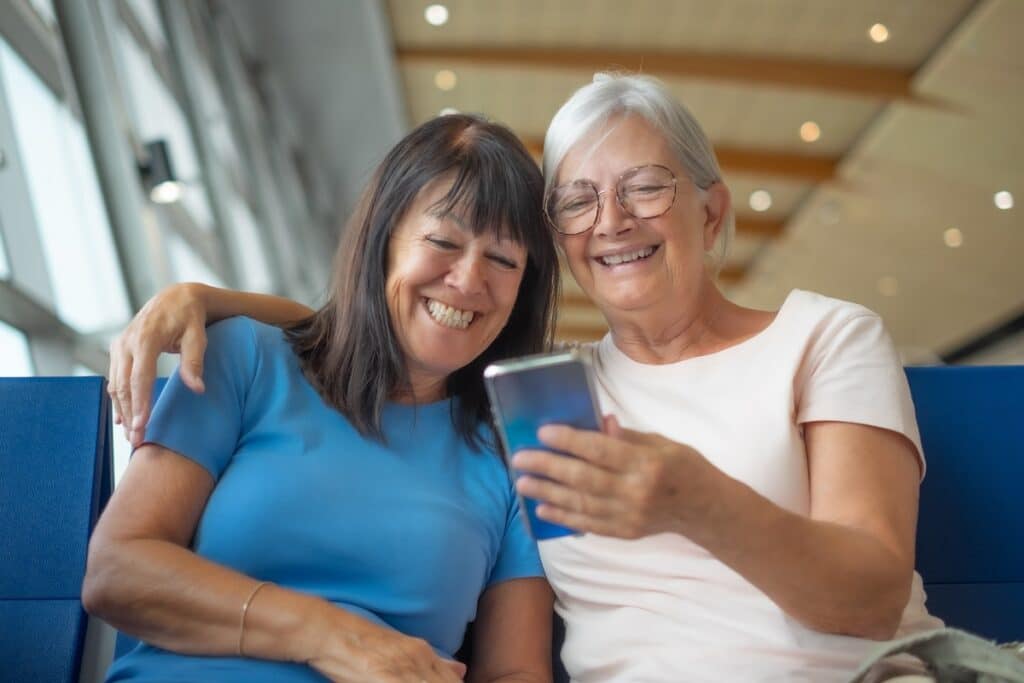 Cumberland Hills | Two senior women viewing a photo