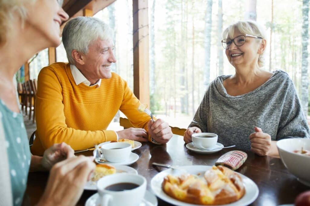 Cumberland Hills | Seniors Laughing at the Breakfast Table