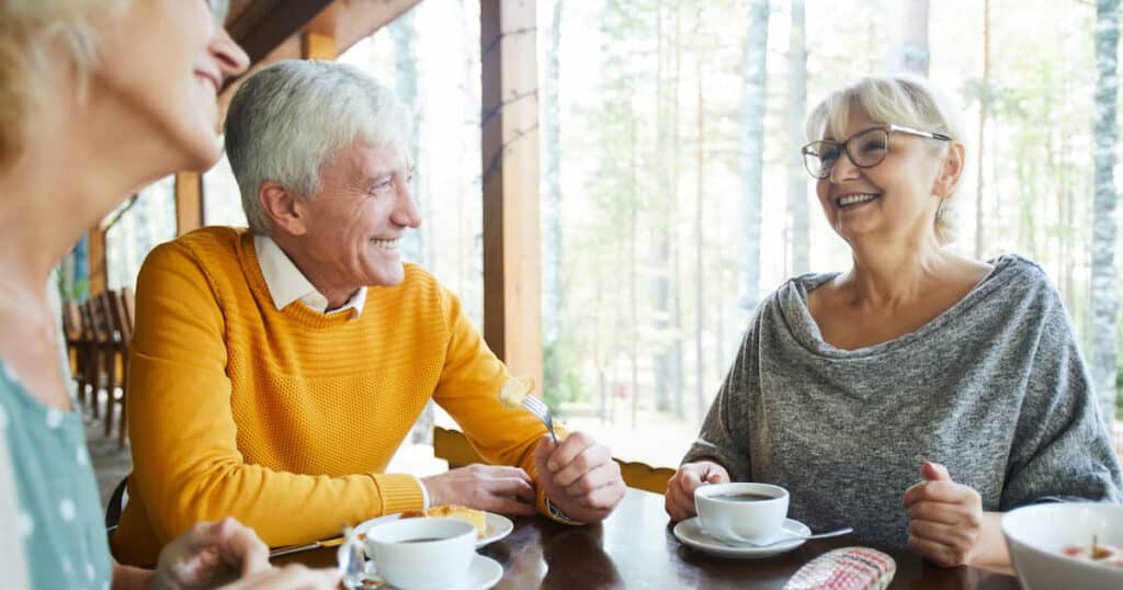 Cumberland Hills | Seniors Laughing at the Breakfast Table