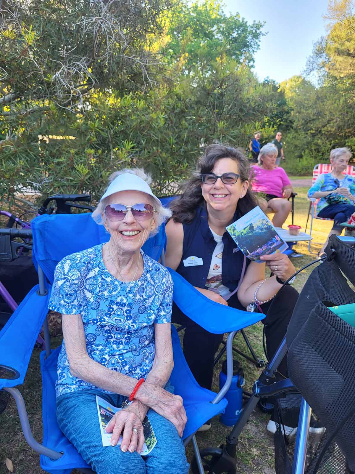 Cumberland Village Independent Living | Seniors enjoying an evening in nature at an outdoor concert